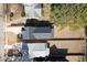 Aerial view of the house with a large backyard, patio, and neighboring homes at 304 Shepherd St, Raleigh, NC 27607