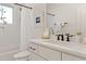 Bright bathroom features a shower, vanity, and modern fixtures, offering a clean and inviting space at 304 Shepherd St, Raleigh, NC 27607