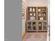 Charming built-in cabinet with glass doors, decorative items, and area rug in the dining area at 304 Shepherd St, Raleigh, NC 27607