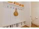 Well-organized mudroom with storage bench, hooks, and cubbies, offering functionality and style for everyday use at 304 Shepherd St, Raleigh, NC 27607
