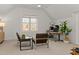 Bright office space with modern desk, comfortable chairs, and ample natural light, perfect for work or study at 304 Shepherd St, Raleigh, NC 27607