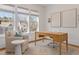 Sunlit home office features a large window, modern desk, and comfortable chair, perfect for productivity at 304 Shepherd St, Raleigh, NC 27607