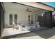Inviting covered patio with comfortable seating, perfect for outdoor relaxation and entertaining guests at 304 Shepherd St, Raleigh, NC 27607