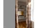 Linen closet with shelving and curtains for storage in the home at 304 Shepherd St, Raleigh, NC 27607