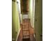 Hallway showcasing access to the attic with a retractable ladder at 312 East End Ave, Durham, NC 27703