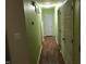 Inviting hallway with hardwood floors and neutral-colored walls at 312 East End Ave, Durham, NC 27703