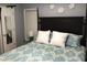Cozy bedroom with a large bed and a view of the window at 312 East End Ave, Durham, NC 27703