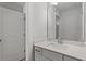 Bright bathroom featuring a white vanity and view to the doorway at 319 N Maple Walk # 213, Garner, NC 27529