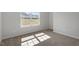 Bedroom with carpet, fresh paint, and plenty of natural lighting at 319 N Maple Walk # 213, Garner, NC 27529