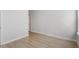 Neutral bedroom with hardwood floors and base trim molding at 319 N Maple Walk # 213, Garner, NC 27529