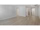 Spacious bonus room featuring hard wood flooring and neutral colored walls at 319 N Maple Walk # 213, Garner, NC 27529