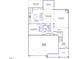 Detailed floor plan showcasing the layout of the first floor including the kitchen, guest bedroom and garage at 319 N Maple Walk # 213, Garner, NC 27529