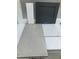 Image showcasing kitchen remodel material samples with gray cabinet and white quartz countertop at 319 N Maple Walk # 213, Garner, NC 27529