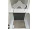 Image showcasing kitchen remodel material samples with hexagon tiles and light-wood flooring at 319 N Maple Walk # 213, Garner, NC 27529
