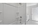 Bathroom featuring white shower and tub, and tile floors at 322 N Maple Walk Walk # 237, Garner, NC 27529