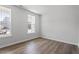 Bright bedroom with hardwood floors and large windows offering plenty of natural light at 322 N Maple Walk Walk # 237, Garner, NC 27529