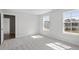 Bright bedroom featuring two bright windows, and plush carpeting at 322 N Maple Walk Walk # 237, Garner, NC 27529