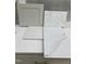 Selection of cabinet door, countertop, and flooring samples with neutral color palette at 322 N Maple Walk Walk # 237, Garner, NC 27529