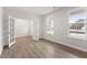 Well-lit room featuring wood floors and French doors, perfect for an office or playroom at 347 N. Maple Walk Dr # 211, Garner, NC 27529