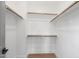 Spacious walk-in closet with ample shelving for storage at 4093 Elk Crk Ln, Raleigh, NC 27612