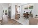 Bright home office with a comfortable workspace, natural light, and stylish decor for a productive atmosphere at 4093 Elk Crk Ln, Raleigh, NC 27612