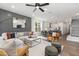 Open floor plan with a modern kitchen, dining area, and living room, with a view to the kitchen at 4095 Elk Crk Ln, Raleigh, NC 27612