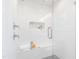 Modern walk-in shower featuring glass enclosure, built-in bench, and dual shower heads at 41 Silver Moon Ln # 115, Clayton, NC 27527