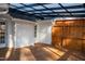 Enclosed deck area featuring a pergola and privacy screens, ideal for outdoor living at 441 Hill Rd, Rougemont, NC 27572