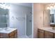 Spacious primary bathroom features double sinks, a glass shower, and ample counter space at 441 Hill Rd, Rougemont, NC 27572