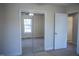 Bedroom view showcasing mirrored closet doors and connecting doors at 441 Hill Rd, Rougemont, NC 27572