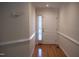 Inviting foyer with hardwood floors and a view of the front door and window at 441 Hill Rd, Rougemont, NC 27572