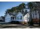 Charming single-story home with a front porch, two-car garage, and well-kept lawn at 441 Hill Rd, Rougemont, NC 27572