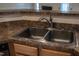 This kitchen features stainless steel appliances, brown countertops, and light wood cabinets at 441 Hill Rd, Rougemont, NC 27572