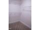Spacious walk-in closet with carpet and wire shelving for ample storage at 441 Hill Rd, Rougemont, NC 27572