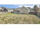 Spacious backyard with a screened in porch, perfect for outdoor entertaining at 457 Cokesbury Park Ln, Fuquay Varina, NC 27526