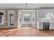 Eat-in kitchen with hardwood floors, bay window and access to the backyard at 4745 Grand Cypress Ct, Raleigh, NC 27604