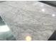 Modern countertop with a beautiful marble-like pattern on kitchen island at 523 E Nelson Ave, Wake Forest, NC 27587