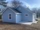Exterior showcasing a two-story house with nice siding and a well-manicured lawn, creating an inviting curb appeal at 523 E Nelson Ave, Wake Forest, NC 27587