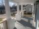 A charming porch with painted brick bases and light wood railing leads to the house entrance at 523 E Nelson Ave, Wake Forest, NC 27587