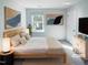 Cozy bedroom featuring natural light, neutral walls, and stylish modern decor at 543 Camel St, Clayton, NC 27520