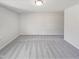 Spacious bonus room featuring neutral paint and plush carpeting at 543 Camel St, Clayton, NC 27520