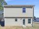 Two-story home featuring classic siding, windows, and a backyard at 543 Camel St, Clayton, NC 27520