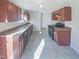 Spacious kitchen featuring wood cabinets and modern appliances at 543 Camel St, Clayton, NC 27520