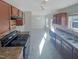 Well-lit kitchen showcases dark cabinets, sleek appliances, and functional layout at 543 Camel St, Clayton, NC 27520