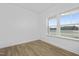 Bright bedroom with natural light from two large windows and hardwood floors at 55 Mable Court # 5, Lillington, NC 27546