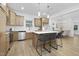 Open kitchen with a large island, stainless steel appliances, and lots of counter space at 55 Mable Court # 5, Lillington, NC 27546