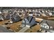 Aerial view of a gray house situated amongst a vibrant residential neighborhood at 5601 Garnet Meadow Rd, Knightdale, NC 27545