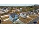 The aerial shot captures homes in a residential neighborhood, with a pool visible at 5601 Garnet Meadow Rd, Knightdale, NC 27545
