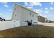 Gray house with white fence and patio offers a cozy outdoor space at 5601 Garnet Meadow Rd, Knightdale, NC 27545
