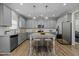 Well-equipped kitchen with island, stainless steel appliances, granite countertops, and ample cabinet space at 5601 Garnet Meadow Rd, Knightdale, NC 27545